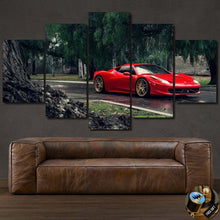 Load image into Gallery viewer, Red Ferrari 458 Italia sports car canvas wall art set above brown leather sofa