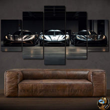 Load image into Gallery viewer, Koenigsegg sports cars multi-panel canvas wall art above brown leather sofa