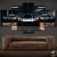 Load image into Gallery viewer, Five-piece Koenigsegg sports car canvas wall art above brown leather sofa in dark room