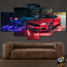 Load image into Gallery viewer, Multi-panel Ford Mustang canvas wall art with red and blue cars and neon lights above brown leather sofa