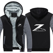 Load image into Gallery viewer, Black and gray Nissan Z Hoodie with zipper and car logo, lined with soft fleece for comfort