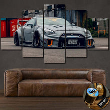 Load image into Gallery viewer, GTR R35 Liberty Walk sports car multi-panel canvas wall art above brown leather sofa
