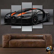 Load image into Gallery viewer, Multi-panel canvas wall art featuring a black Bugatti Chiron Super Sport with orange racing stripes above a brown leather sofa