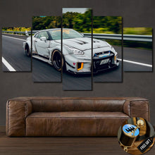 Load image into Gallery viewer, Nissan GT-R R35 Liberty Walk sports car multi-panel canvas wall art above brown leather sofa