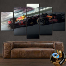Load image into Gallery viewer, Multi-panel Formula F1 Canvas wall art featuring a Red Bull racing car above a brown leather sofa with a free gear shifter keychain gift.