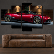 Load image into Gallery viewer, Pagani Huayra sports car canvas wall art in 5 panels above brown leather sofa