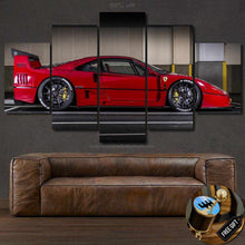 Load image into Gallery viewer, F40 Canvas multi-panel wall art featuring red Ferrari sports car above brown leather sofa