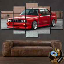 Load image into Gallery viewer, Red BMW E30 M3 car multi-panel canvas wall art above leather sofa with free gear shifter keychain gift