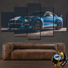 Load image into Gallery viewer, Ford Mustang blue sports car multi-panel canvas wall art above brown leather sofa