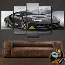 Load image into Gallery viewer, Lamborghini Centenario Canvas wall art set of five black and yellow sports car prints above brown leather sofa