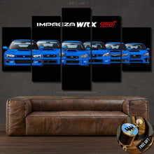 Load image into Gallery viewer, Multi-panel canvas print featuring blue Subaru Impreza WRX STI Evolution cars in front view with logo above, displayed above a brown leather sofa.