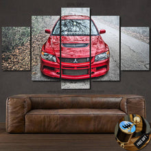 Load image into Gallery viewer, Mitsubishi Evolution EVO 9 red sports car canvas wall art above brown leather sofa with free gear shifter keychain gift