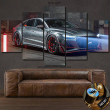 Load image into Gallery viewer, Audi RS7-R sports car multi-panel canvas wall art above brown leather sofa with gear shifter keychain gift