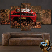 Load image into Gallery viewer, Multi-panel F430 Canvas wall art featuring red sports car rear view in autumn leaves above brown leather sofa with free gear shifter keychain gift