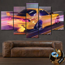 Load image into Gallery viewer, Mazda RX7 canvas wall art with yellow sports car and exhaust flames, framed multi-panel print above brown leather sofa