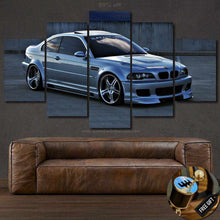 Load image into Gallery viewer, BMW E46 M3 canvas wall art set above brown leather sofa, silver sports car print with free gear shifter keychain gift