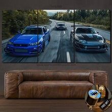 Load image into Gallery viewer, JDM canvas wall art featuring three sports cars driving on a forest road, perfect gift for car enthusiasts with free gear shifter keychain.