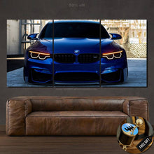 Load image into Gallery viewer, BMW F80 M3 blue car front view split canvas wall art above brown leather sofa