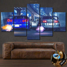 Load image into Gallery viewer, Toyota Supra MK4 car dual exhaust flame canvas wall art above brown leather sofa