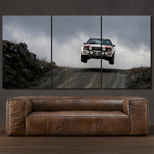 Laden Sie das Bild in den Galerie-Viewer, Audi Quattro Rally Car 3-piece framed canvas print – premium motorsport wall art