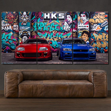 Laden Sie das Bild in den Galerie-Viewer, Toyota Supra &amp; Nissan GT-R R34 3-piece framed canvas print – premium motorsport wall art
