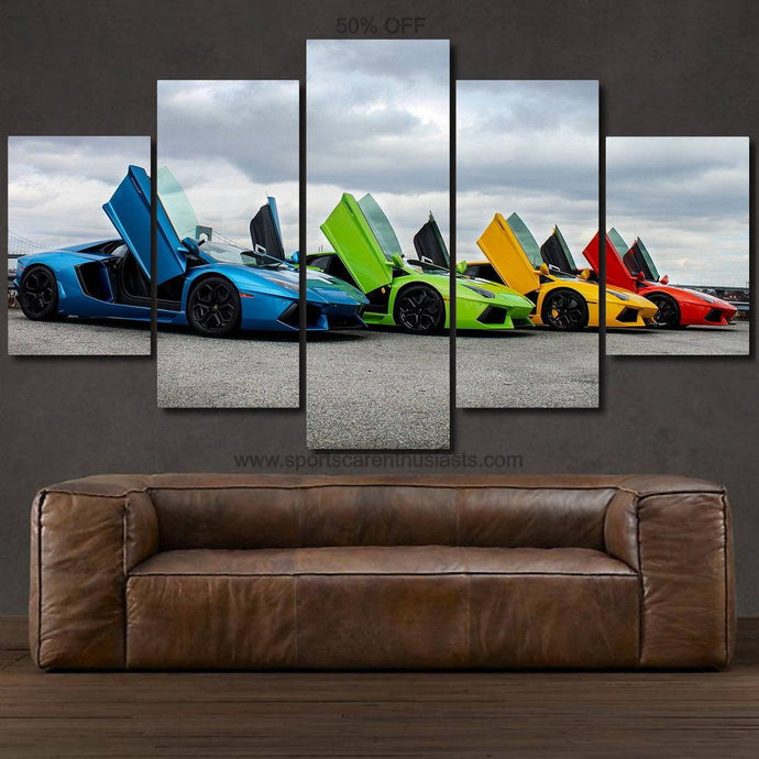 Multicolor Lamborghini Aventador cars with open doors on a multi-panel canvas wall art above brown leather sofa