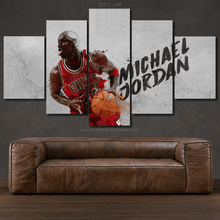 Load image into Gallery viewer, Michael Jordan basketball action multi-panel canvas wall art above brown leather sofa