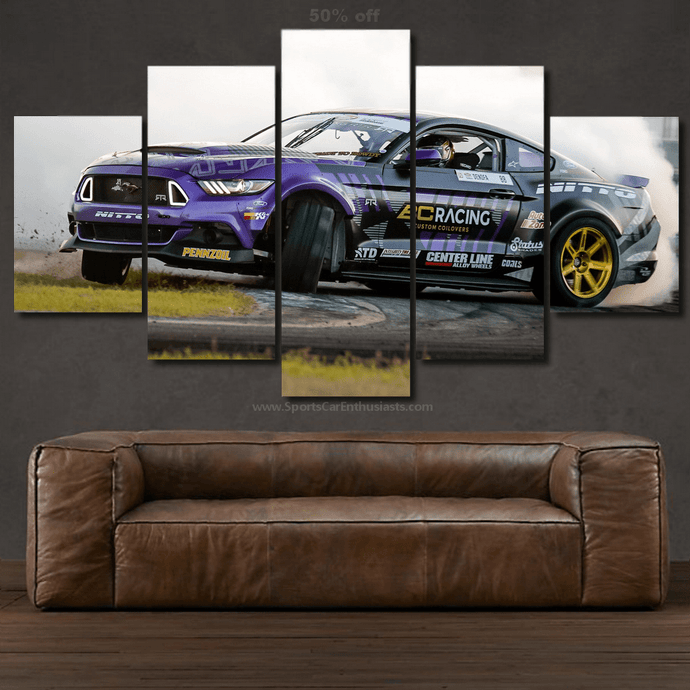 Multi-panel Ford Mustang Drift canvas wall art above a brown leather sofa in a modern living room.