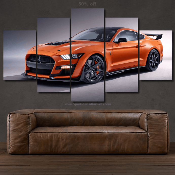 Ford Mustang Shelby GT500 orange sports car canvas wall art multi-panel set above brown leather sofa