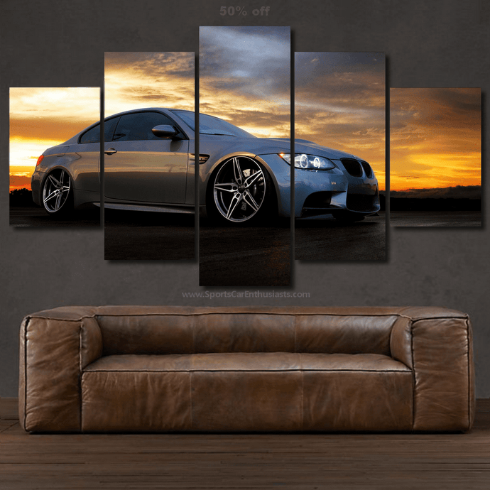 BMW E92 M3 canvas wall art in five-piece set showcasing the car at sunset above a leather sofa.