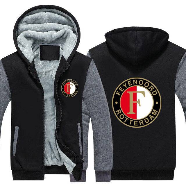 Black and gray FC Feyenoord hoodie with zipper and fleece lining, featuring logo on chest and back, unisex adult EU/US sizes.